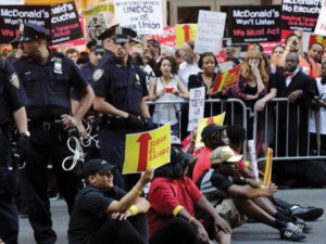 Fast-food workers strike for higher pay in LA, across US