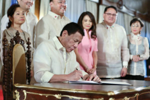Duterte signs law providing health care to all Filipinos